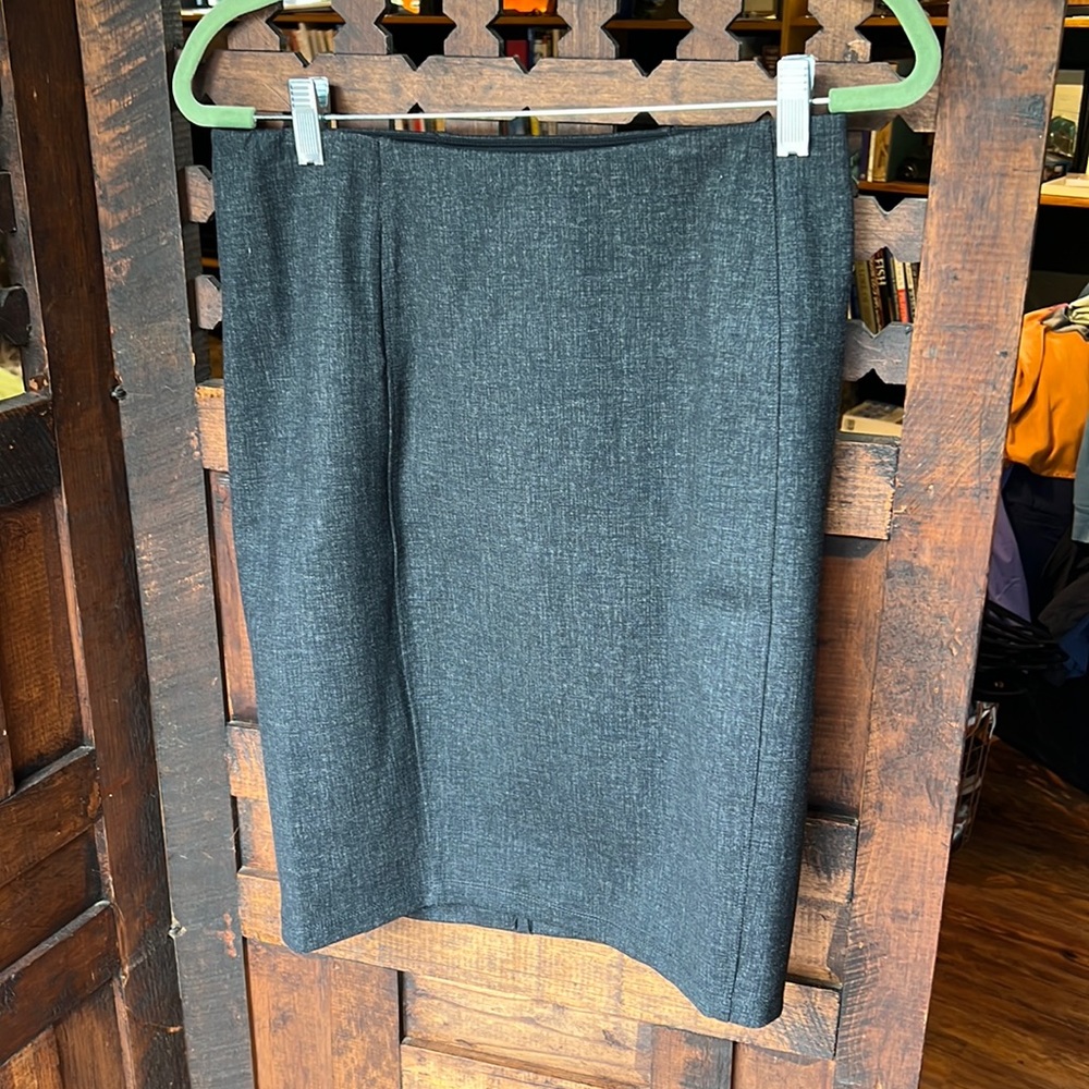 Above the knee, stretchy skirt.